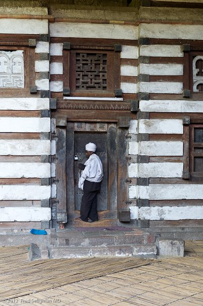 20120403_102501 Nikon D3S 2x3.jpg - We 'lucked' out - the very head priest is here today.  He is unlocking the entrance for us to have a private showing